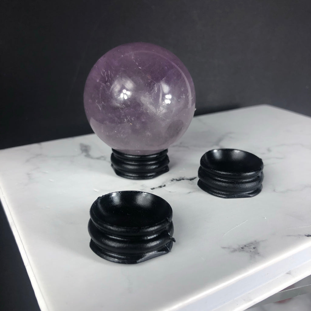 One Black Plastic Sphere Stand